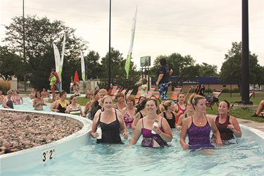 People participating in the lazy 5k in the pool