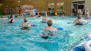 Group of women participating in an aquafit class