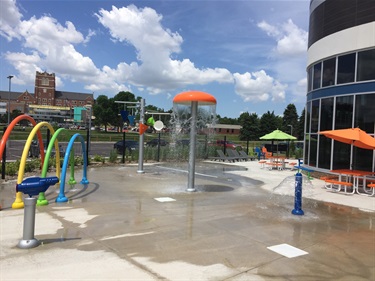 The Splash Pad and outdoor Sun Deck are located on the south side of the facility. The splash pad is fun for all ages and includes interactive play features and outdoor seating. Midco Aquatic Center guests will be able to access the splash pad from the recreation pool.