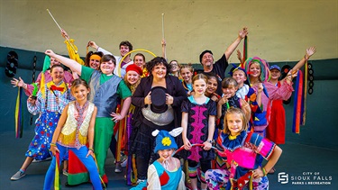 actors in costume on stage