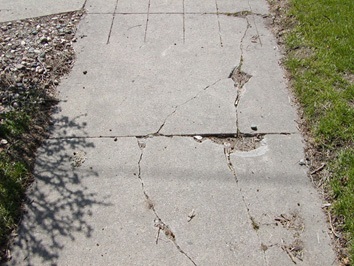 Holes in the sidewalk