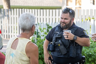 Police officer talking with a citizen