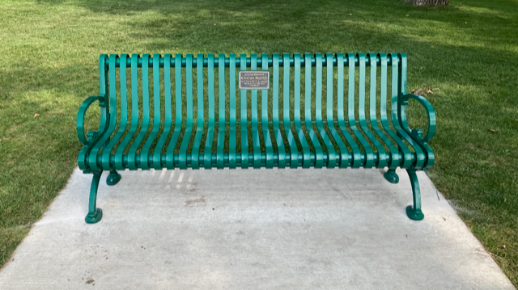 green colored park style bench