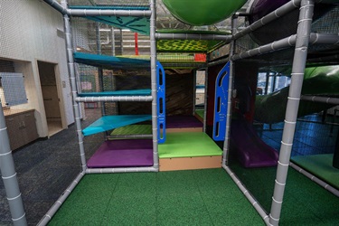 Colorful climbing steps on the multilevel play structure