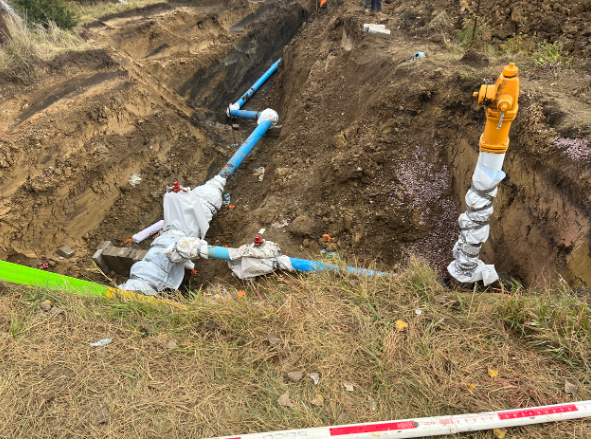 Watermain connection on the east side of 476th Ave and the fire hydrant. 