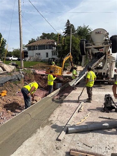 Crews installing new curbs on Minnesota Avenue