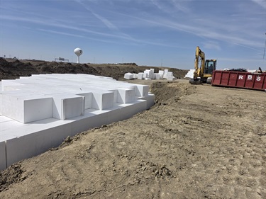 an image of white geoform blocks being prepared for installation