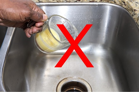 person pouring grease down the sink with red x on top of image to show not to do this